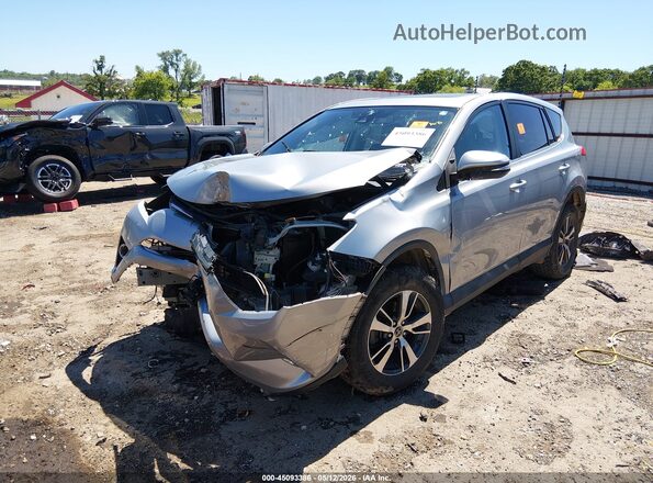 2T3RFREV5JW698469 2018 TOYOTA LE Silver 