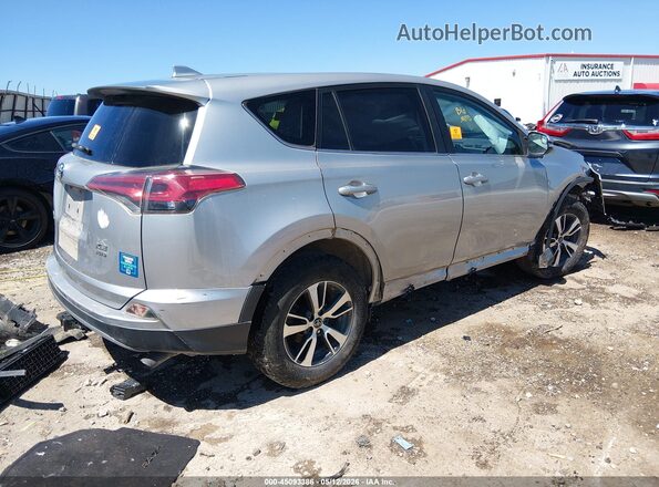 2T3RFREV5JW698469 2018 TOYOTA LE Silver 
