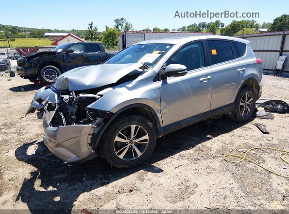 2T3RFREV5JW698469 2018 TOYOTA LE Silver 