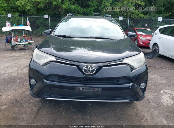 2T3RFREV6GW488374 2016 TOYOTA RAV4 Black Вид задньої частини салону