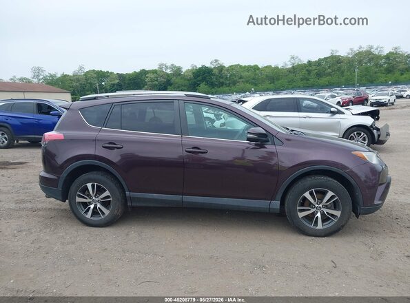 2T3RFREV6JW726828 2018 TOYOTA RAV4 Burgundy Widok wnętrza z tyłu