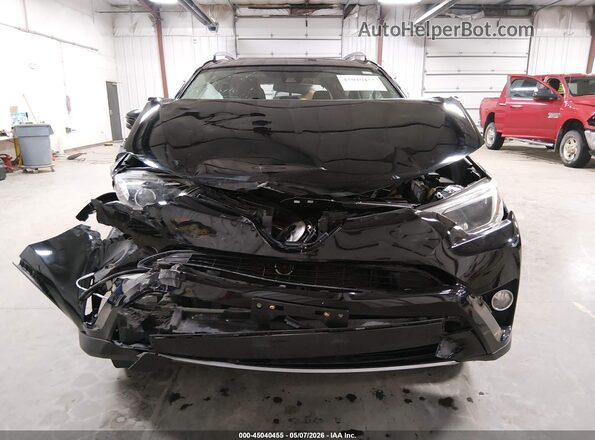2T3RFREV6JW831207 2018 TOYOTA LE Черный Вид спереди