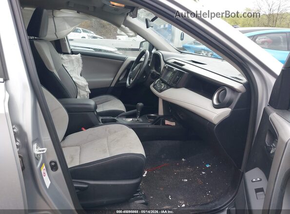 2T3RFREV7GW509359 2016 TOYOTA LE Silver Widok wnętrza z przodu