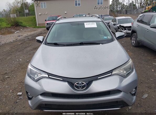 2T3RFREV7GW509359 2016 TOYOTA LE Silver Widok wnętrza z tyłu