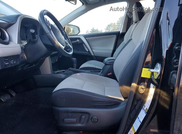 2T3RFREV7JW706684 2018 TOYOTA RAV4 Black წინა სალონის ხედი