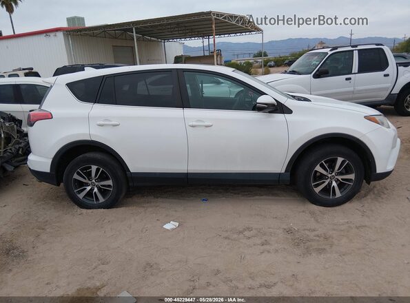 2T3RFREV7JW804310 2018 TOYOTA RAV4 White ხელსაწყოთა პანელის ხედი