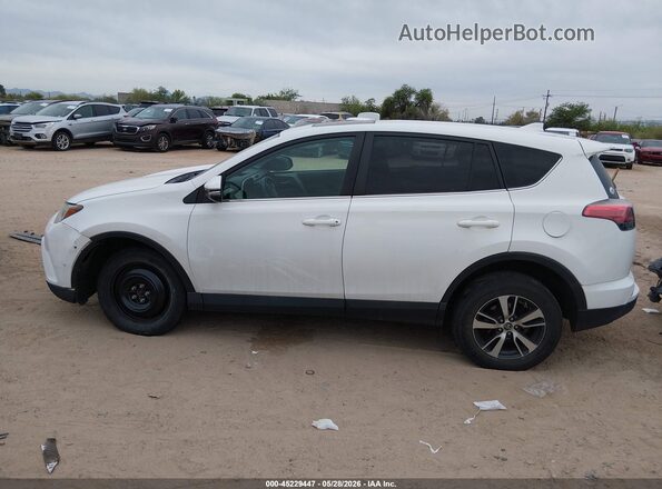2T3RFREV7JW804310 2018 TOYOTA RAV4 White უკანა სალონის ხედი