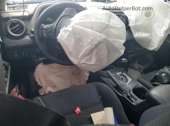 2T3RFREV7JW823973 2018 TOYOTA RAV4 Silver Widok deski rozdzielczej