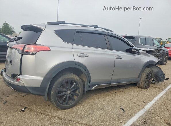 2T3RFREV7JW823973 2018 TOYOTA RAV4 Silver Tył prawy