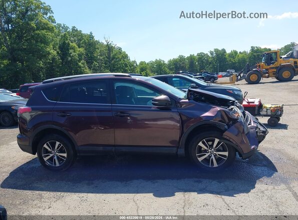 2T3RFREV8JW754419 2018 TOYOTA RAV4 Purple Вид задньої частини салону