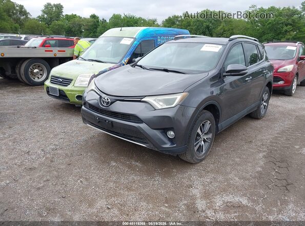 2T3RFREV9GW459824 2016 TOYOTA RAV4 Gray Vista tres cuartos delantera izquierda