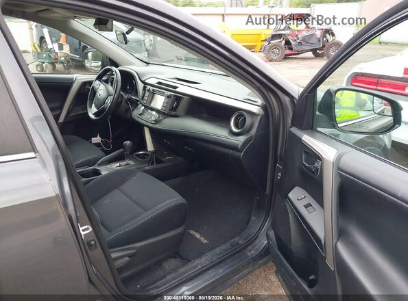 2T3RFREV9GW459824 2016 TOYOTA RAV4 Gray Vista interior delantera