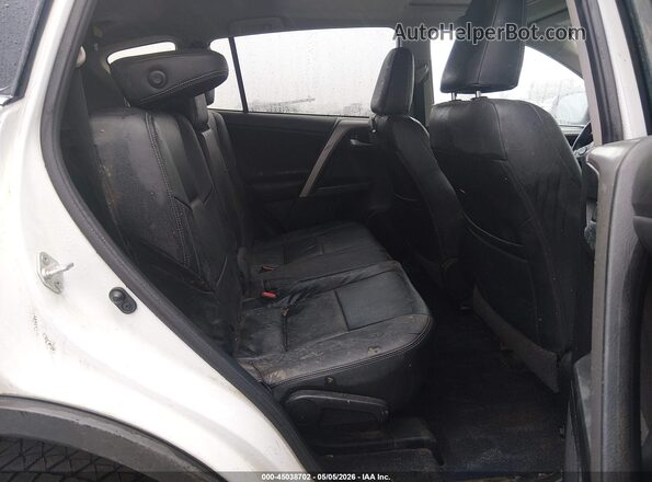 2T3RFREVXJW770010 2018 TOYOTA RAV4 White VIN sticker view