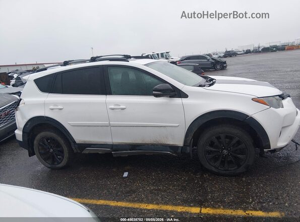 2T3RFREVXJW770010 2018 TOYOTA RAV4 White Rear interior view