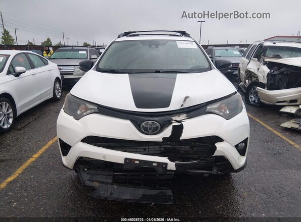 2T3RFREVXJW770010 2018 TOYOTA RAV4 White Instrument cluster view