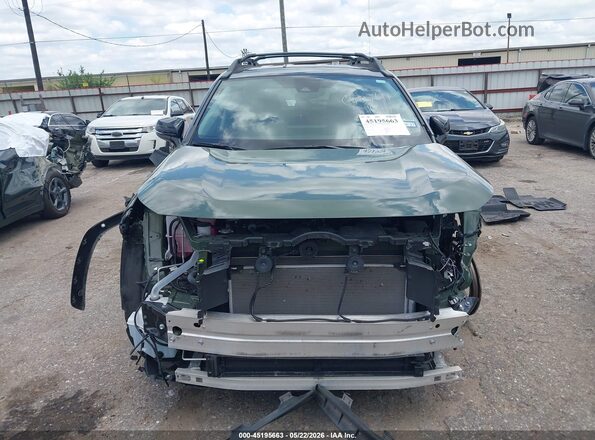 2T3UWRFV4SW289714 2025 TOYOTA RAV4 HYBRID Green Vista interior trasera