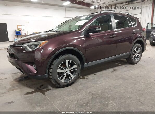 2T3WFREV0GW290991 2016 TOYOTA LE Purple Front left