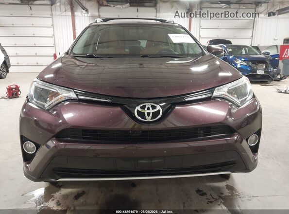 2T3WFREV0GW290991 2016 TOYOTA LE Purple Rear interior view
