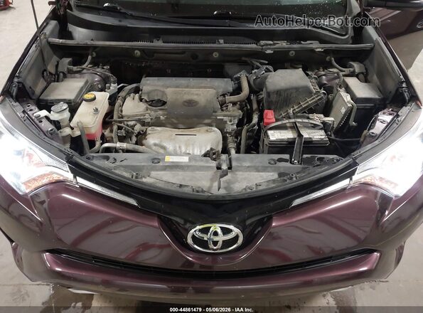 2T3WFREV0GW290991 2016 TOYOTA LE Purple Rear view