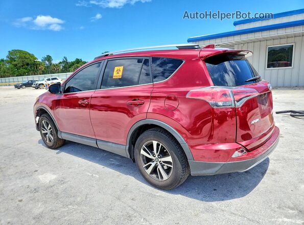 2T3WFREV3JW408717 2018 TOYOTA RAV4 Red Rear left
