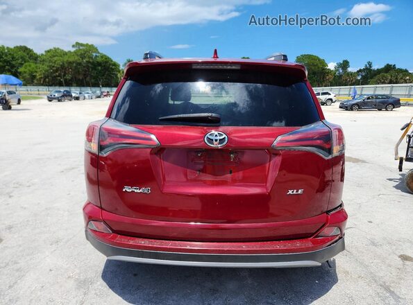 2T3WFREV3JW408717 2018 TOYOTA RAV4 Red Rear view