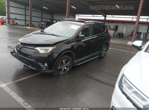 2T3WFREV6HW368109 2017 TOYOTA RAV4 Black Vista tres cuartos delantera izquierda
