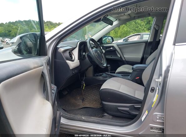 2T3WFREV7JW410695 2018 TOYOTA RAV4 Silver Front interior view