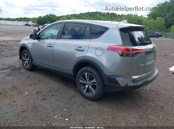 2T3WFREV7JW410695 2018 TOYOTA RAV4 Silver Rear left