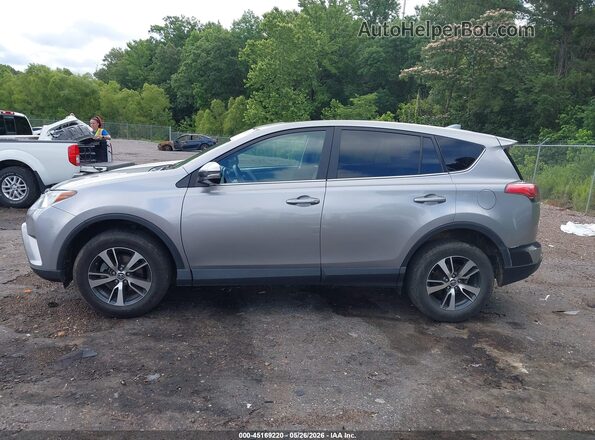 2T3WFREV7JW410695 2018 TOYOTA RAV4 Silver 360 interior view