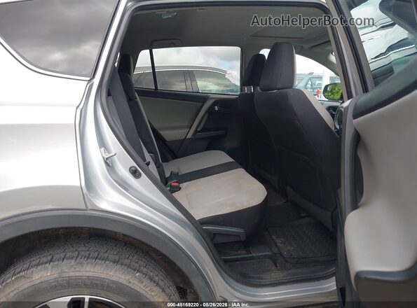 2T3WFREV7JW410695 2018 TOYOTA RAV4 Silver VIN sticker view