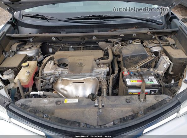 2T3WFREV7JW410695 2018 TOYOTA RAV4 Silver Rear view