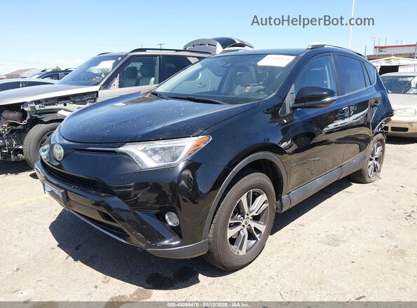 2T3WFREV7JW441297 2018 TOYOTA LE Черный Передняя левая четверть