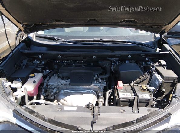 2T3WFREV7JW441297 2018 TOYOTA LE Черный Вид сзади
