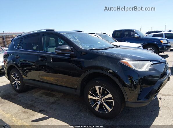2T3WFREV7JW441297 2018 TOYOTA LE Черный Вид задней части салона
