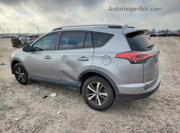 2T3WFREV7JW477099 2018 TOYOTA LE Silver Հետևի ձախ