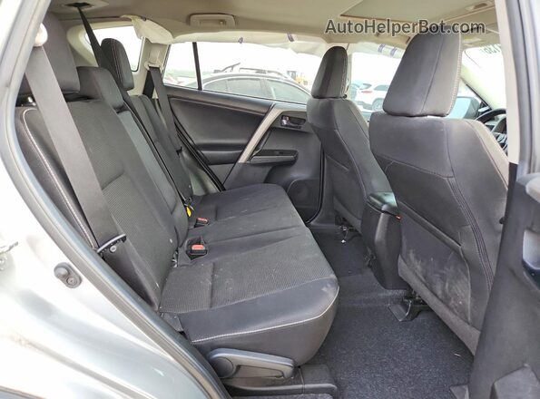 2T3WFREV7JW477099 2018 TOYOTA LE Silver Հետևի նստատեղերի տեսք
