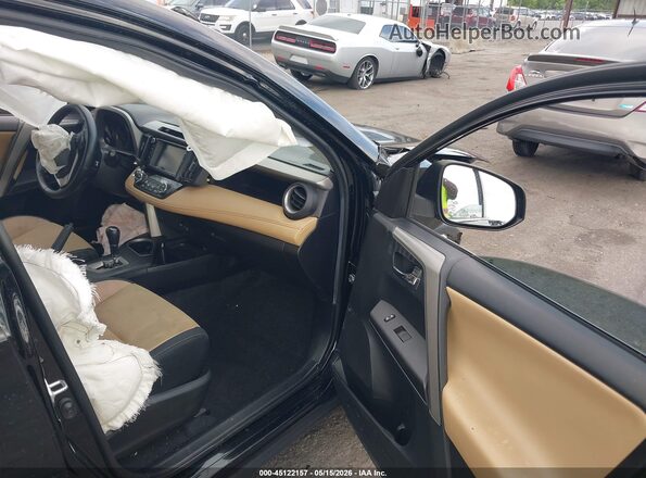 2T3WFREV8JW469948 2018 TOYOTA RAV4 Black Вид салону спереду
