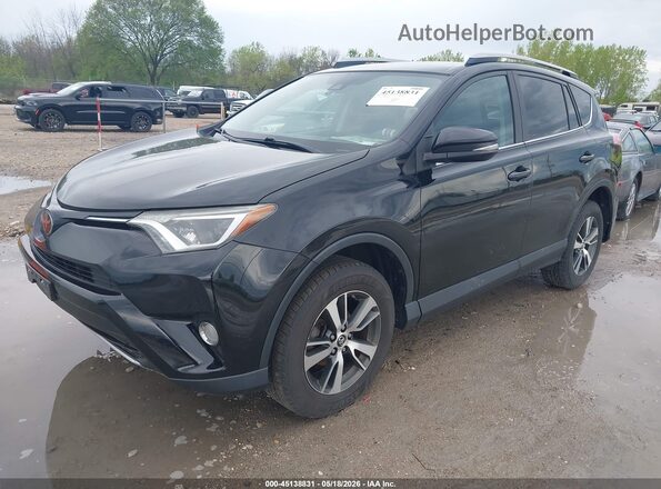 2T3WFREV9JW413050 2018 TOYOTA RAV4 Black 