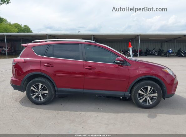2T3WFREV9JW470736 2018 TOYOTA RAV4 Red უკანა სალონის ხედი