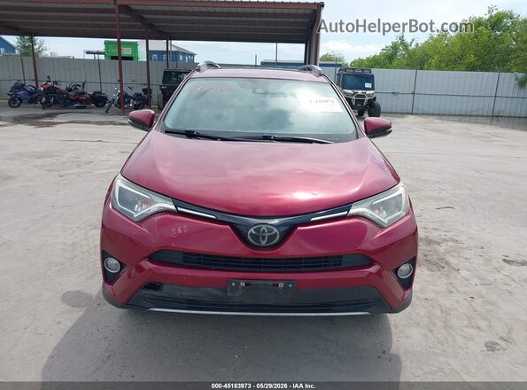 2T3WFREV9JW470736 2018 TOYOTA RAV4 Red ხელსაწყოთა პანელის ხედი