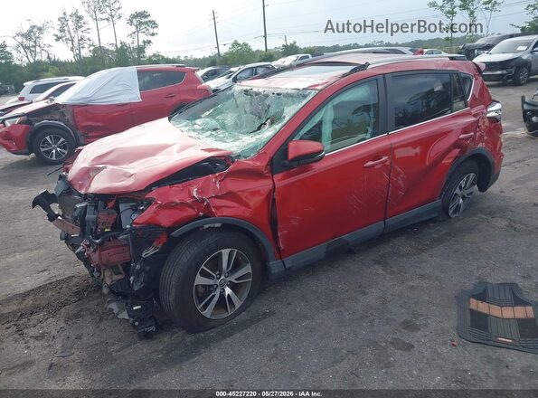 2T3WFREVXHW389397 2017 TOYOTA RAV4 Red Front left