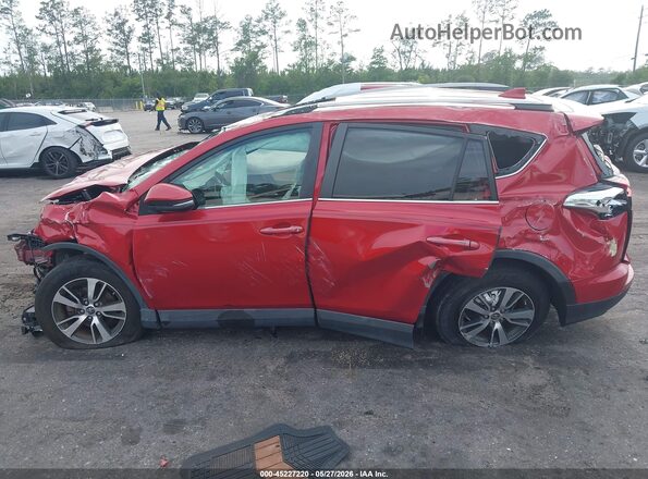 2T3WFREVXHW389397 2017 TOYOTA RAV4 Red Rear interior view