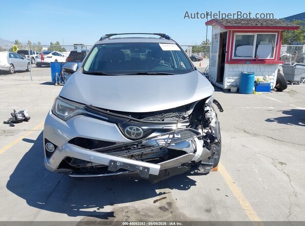 2T3YFREV0HW324180 2017 TOYOTA RAV4 Silver უკანა სალონის ხედი