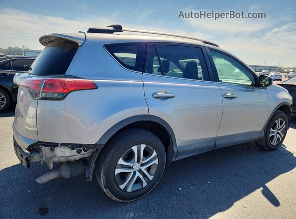 2T3ZFREV0HW373593 2017 TOYOTA RAV4 Silver 