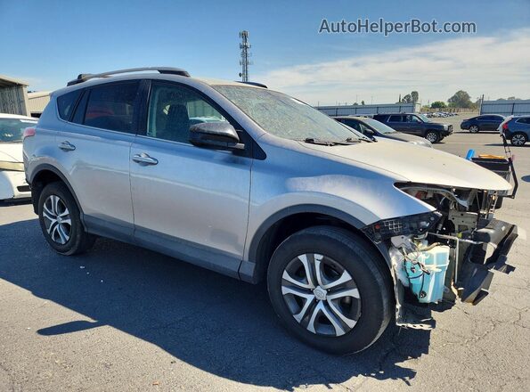 2T3ZFREV0HW373593 2017 TOYOTA RAV4 Silver 