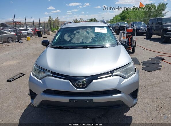 2T3ZFREV1JW426002 2018 TOYOTA RAV4 Silver ხელსაწყოთა პანელის ხედი