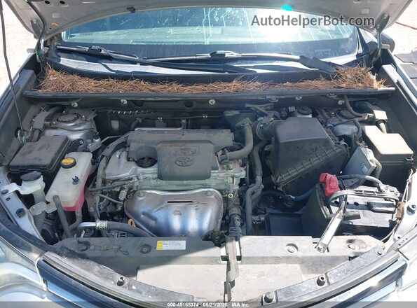 2T3ZFREV1JW426002 2018 TOYOTA RAV4 Silver უკანა ხედი