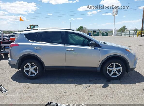 2T3ZFREV1JW426002 2018 TOYOTA RAV4 Silver უკანა სალონის ხედი