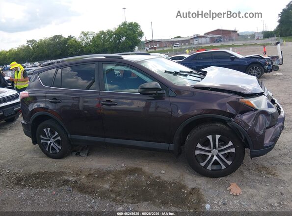 2T3ZFREV2HW346881 2017 TOYOTA RAV4 Purple Rear interior view