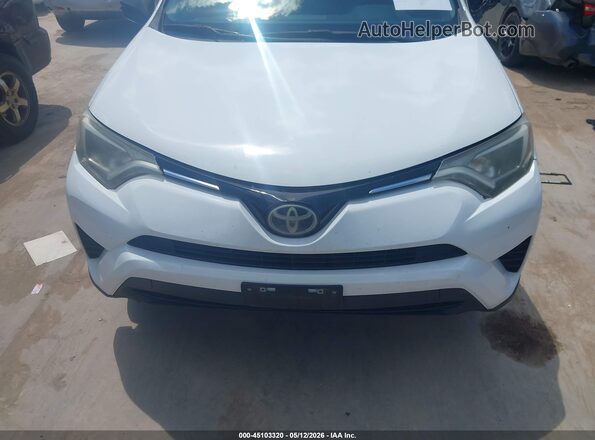 2T3ZFREV3HW359462 2017 TOYOTA LE White Rear interior view